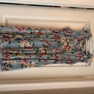 Baby Blue Sleeveless Dress with Floral Pattern